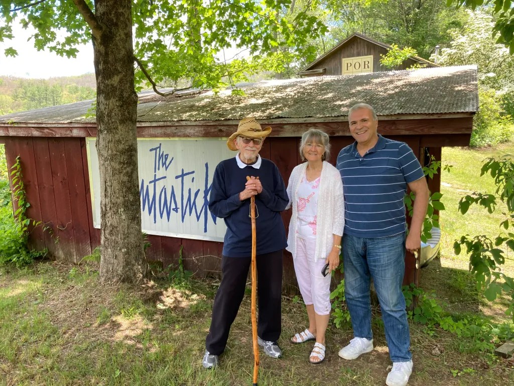 A full-circle moment for Robert standing alongside his wife Donna visiting his now friend, "The Fantasticks" librettist, Tom Jones with the original logo that hung over Sullivan Street Playhouse now at his farm in Connecticut.